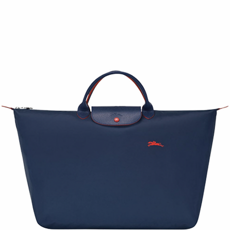 Sac de voyage en toile et cuir LONGCHAMP gamme Le Pliage Club couleur bleu marine