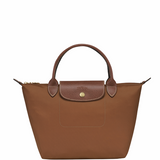 Petit sac à main en toile et cuir LONGCHAMP gamme Le Pliage Original couleur marron cognac